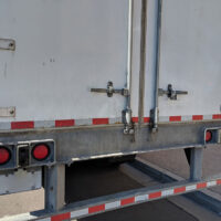 Closeup Of The Rear Doors Of A Trailer Door Hinge Replacement
