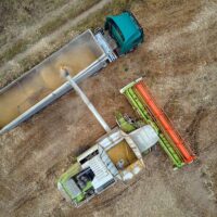 Types of Agricultural Trailers Aerial View of Harvester and Grain Cargo Trailer